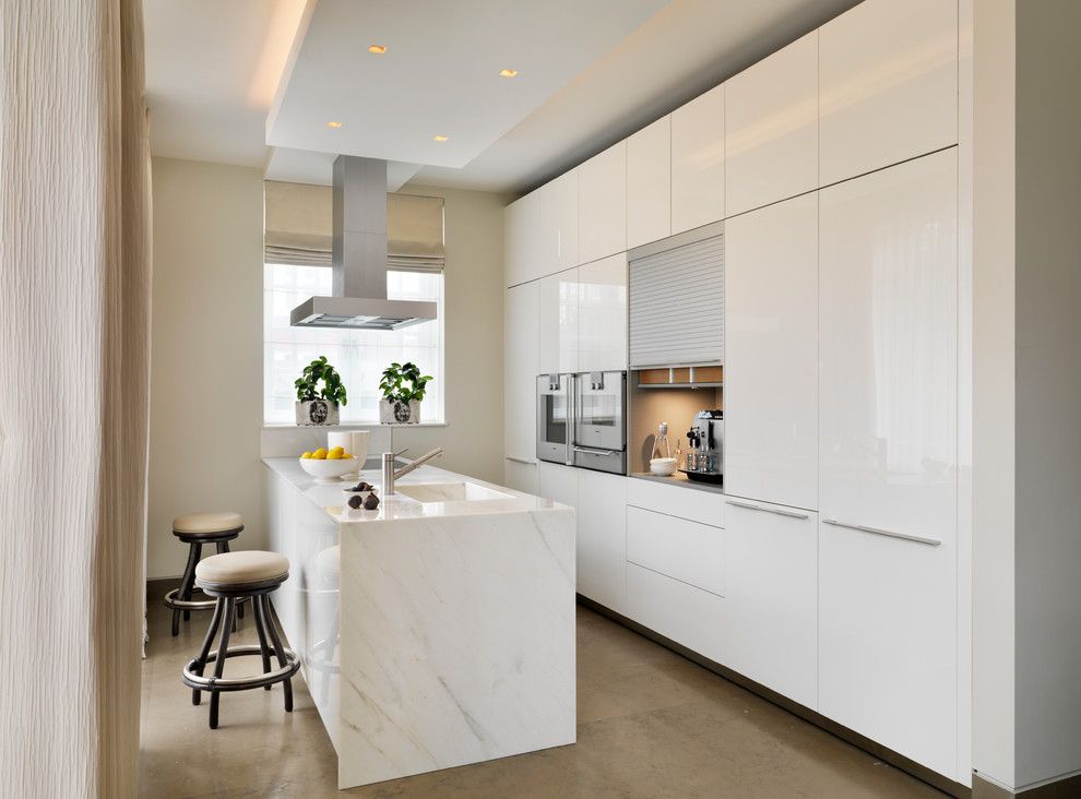 Kettle Moraine Appliance for a Contemporary Kitchen with a Beige Floor Tile and Luxury Apartment by Bulthaup by Kitchen Architecture