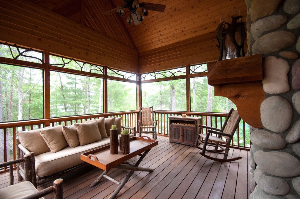 Kettle River Furniture for a Rustic Deck with a Ceiling Fan and Outdoor Space by Hillcrest Home of Keowee Inc.