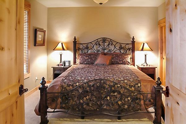 King Ranch Turfgrass for a Farmhouse Bedroom with a Wrought Iron and Brasada Ranch Resort – Rimrock 1 Story Cabin with Lock Offs (For Rental) by Western Design International