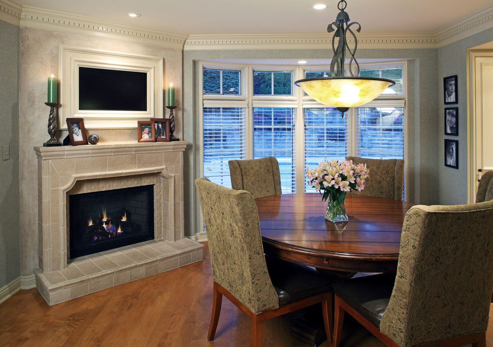 Kitchen Table Omaha for a Traditional Dining Room with a Mantle and Project 'Thirty' by Cramer Kreski Designs