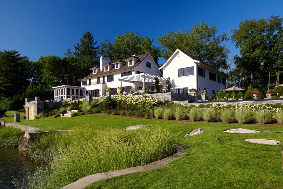 Lake Winnipesaukee Real Estate for a Transitional Exterior with a Lake Front and Greenwich Residence by Leap Architecture