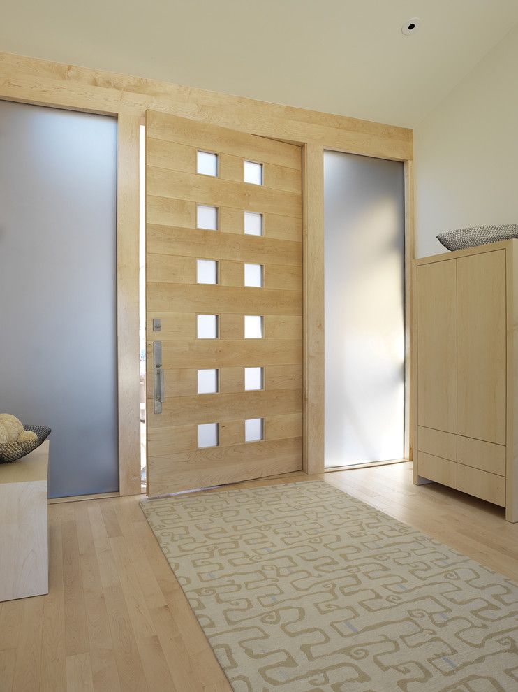 Larsondoors.com for a Contemporary Entry with a Wood Door and 