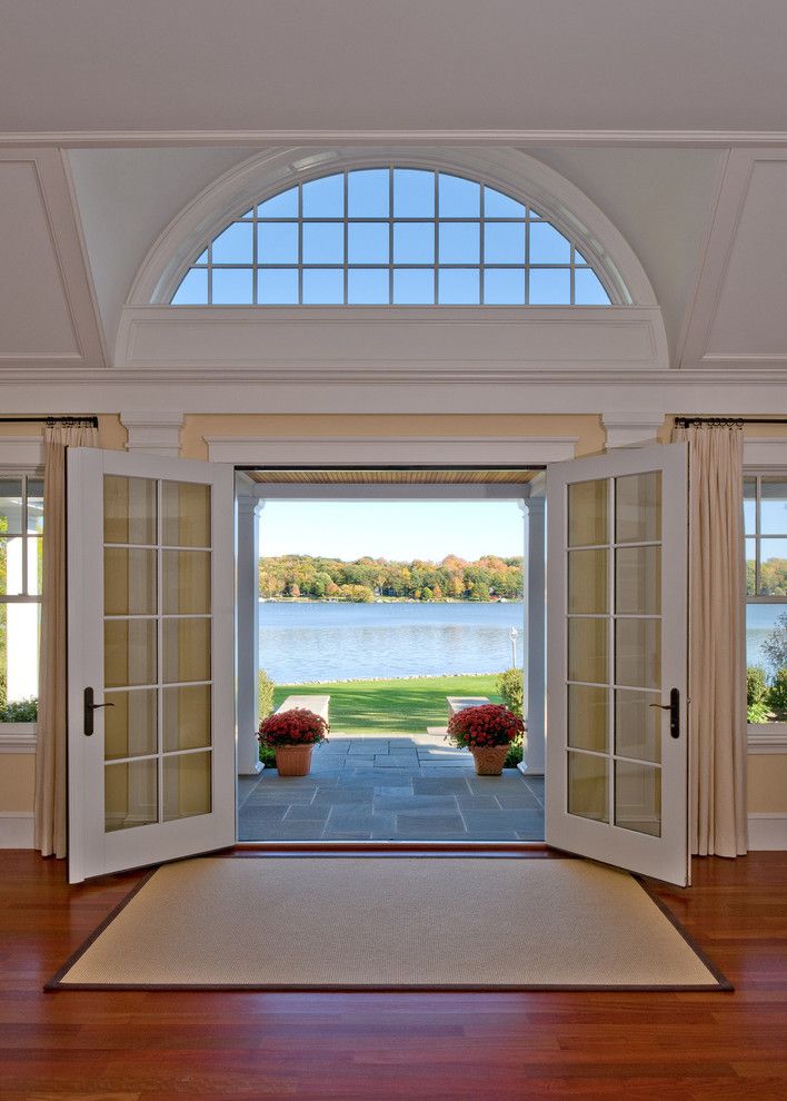 Larsondoors.com for a Traditional Entry with a Radius Window and From Kids to Quiet by Siemasko + Verbridge