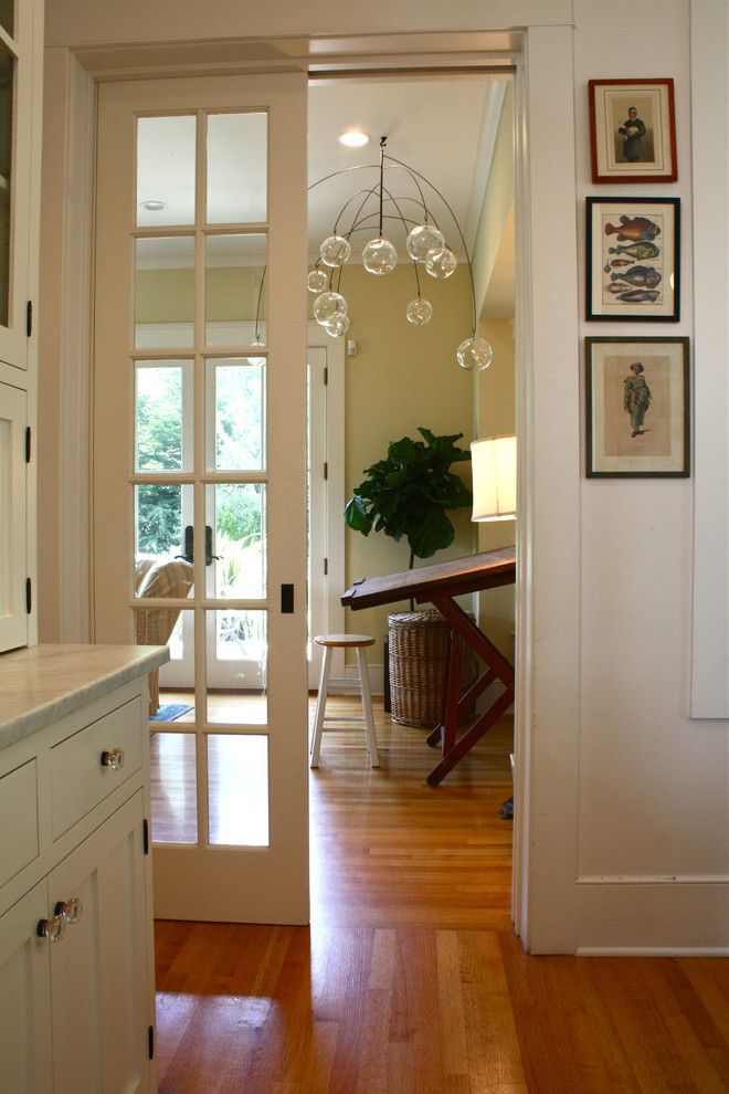 Larsondoors.com for a Traditional Hall with a Door Casing and Family Room by Shannon Malone