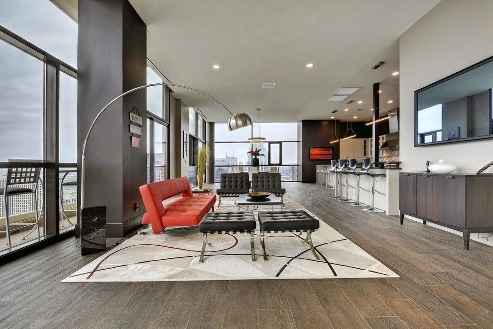 Laying Laminate Flooring for a Contemporary Living Room with a Long Room and Modern Austin Home by Robin Bond Interiors