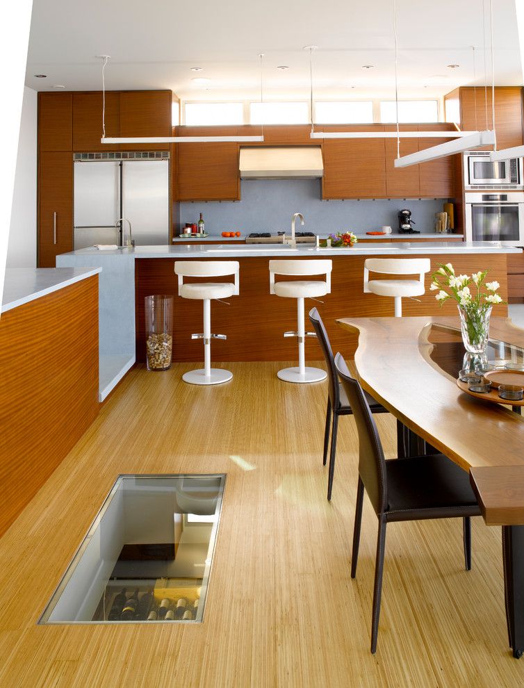 Laying Laminate Flooring for a Modern Kitchen with a Touch Latch and Ballard Cut by Prentiss Balance Wickline Architects