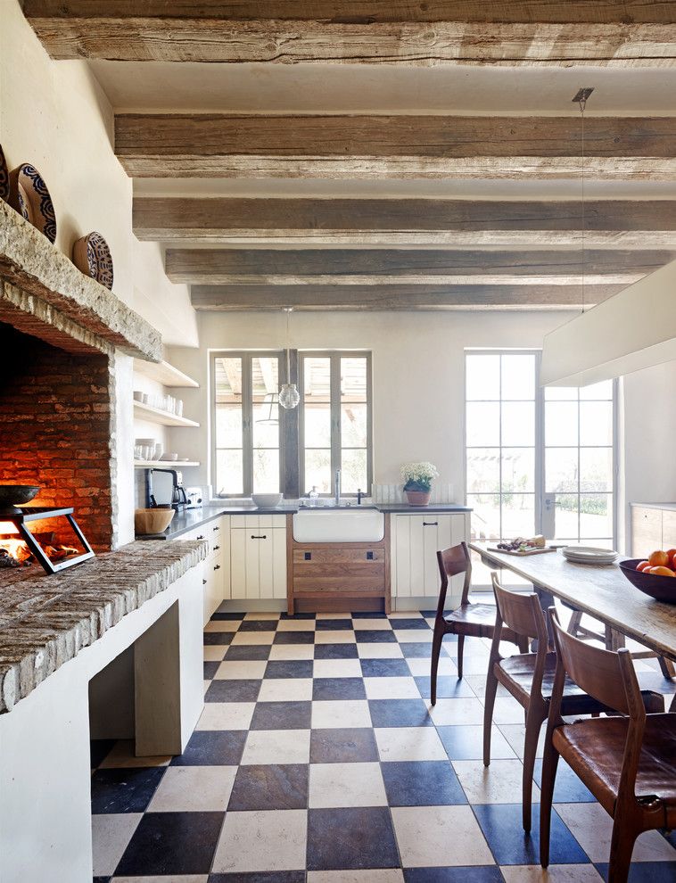 Laying Laminate Flooring for a Rustic Kitchen with a Check Pattern and Oz Architects by Don Ziebell