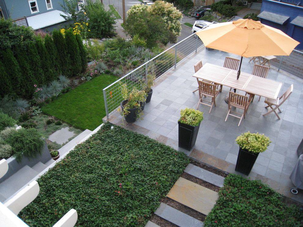 Laying Pavers for a Contemporary Landscape with a Patio Furniture and Two Rooms by Modernbackyard