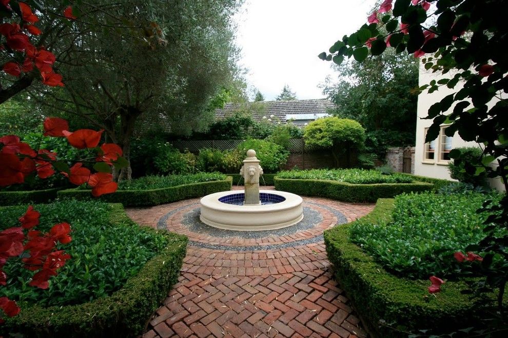 Laying Pavers for a Mediterranean Landscape with a Fountain and Mediterranean Retreat in Palo Alto by Houzz.com