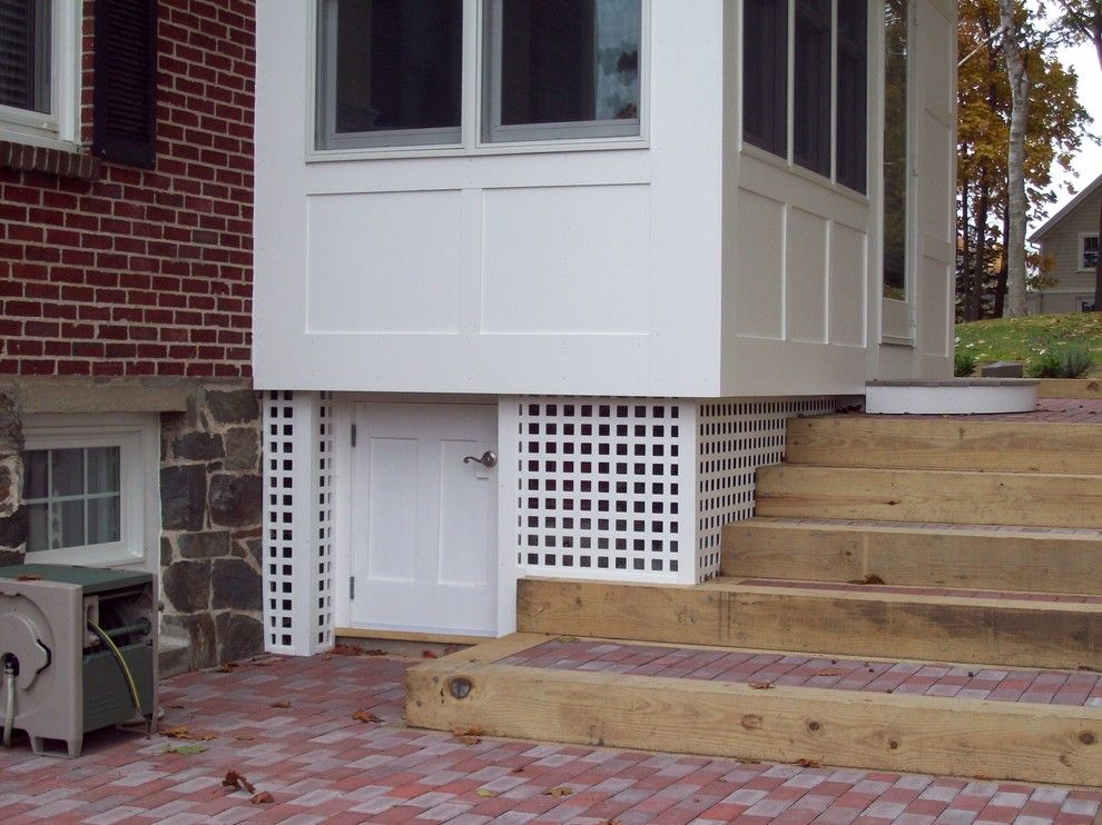 Laying Pavers for a Traditional Exterior with a Pavers and Sunroom Addition with Exterior Storage by O'shea Builders Llc.