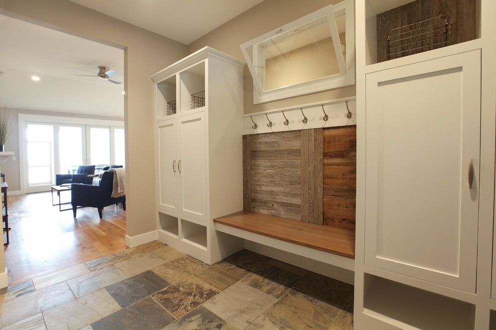 Leeds Certification for a Beach Style Entry with a Mudroom and Wake Robin Cottage by Cottage Home, Inc.