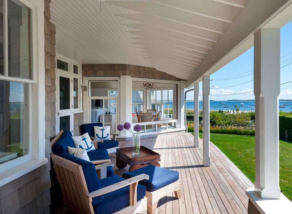 Levin Furniture Locations for a Beach Style Porch with a Cape Cod Style and Cape House by Curl Simitis Architecture+Design