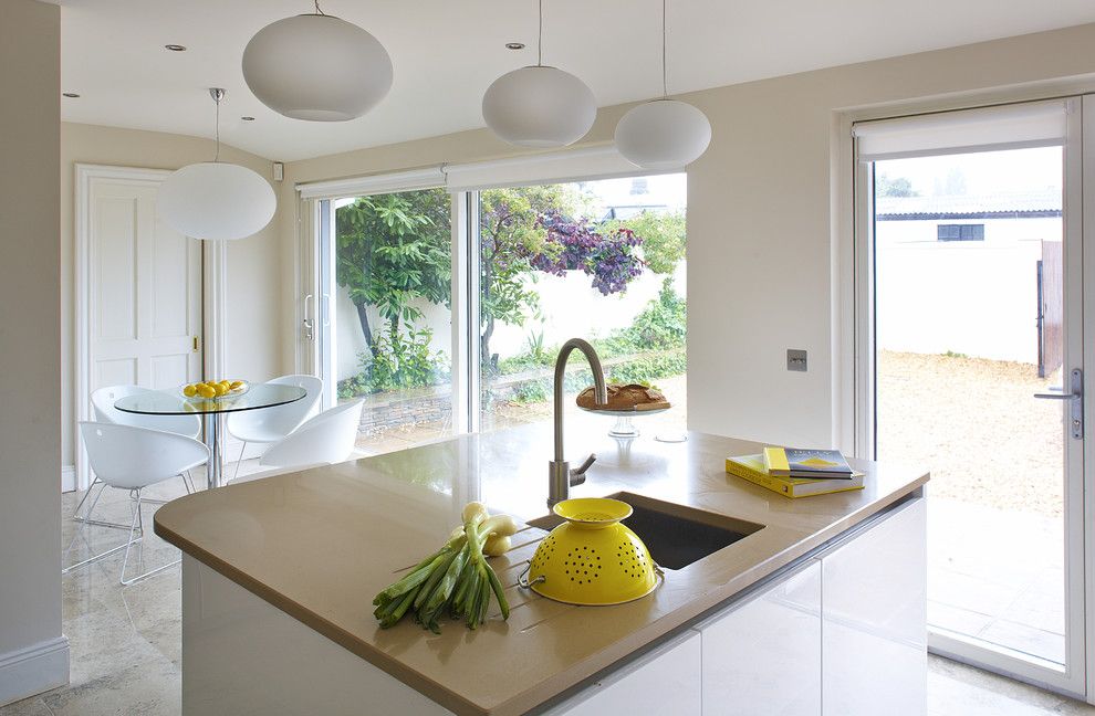 Lightbright for a Contemporary Kitchen with a Kitchen Island and Bright and Clean Kitchen with a Hint of Yellow by Optimise Design