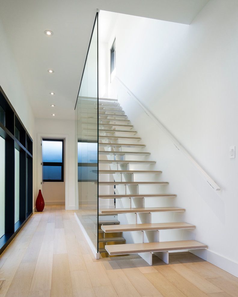 Lightbright for a Modern Staircase with a Carrothers and Associates and Grey House by Carrothers and Associates Inc.