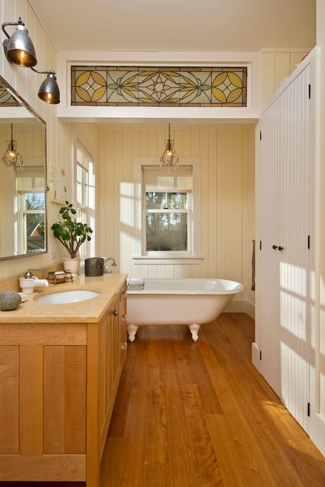 Lillians for a Farmhouse Bathroom with a White Cabinets and Leed Platinum Home by Phinney Design Group