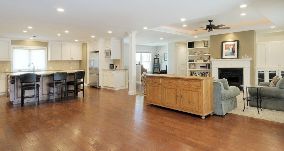 Linon for a Traditional Family Room with a Wood Floor and Ranch Style Dressing by Morse Custom Homes and Remodeling