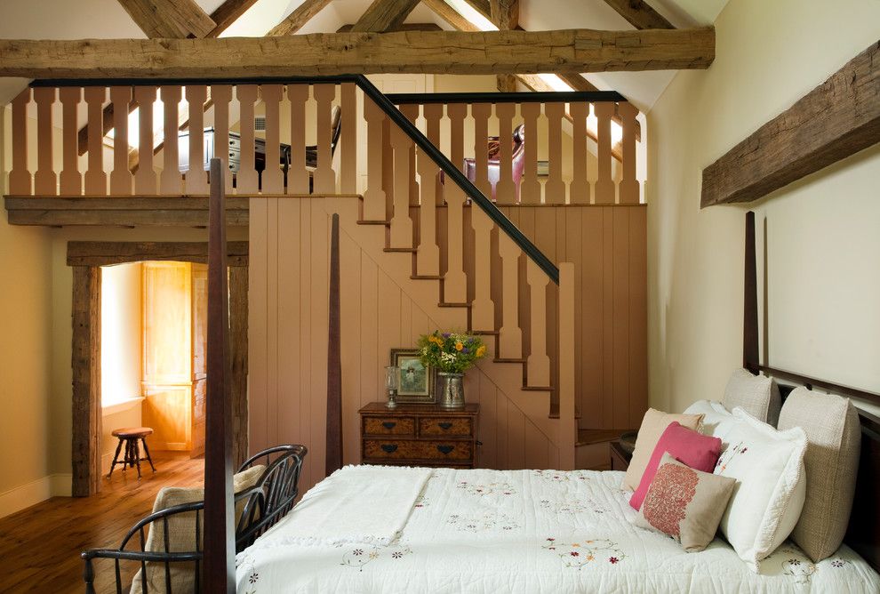 Lofting for a Farmhouse Bedroom with a Exposed Beams and Cold Springs Farm by Period Architecture Ltd.