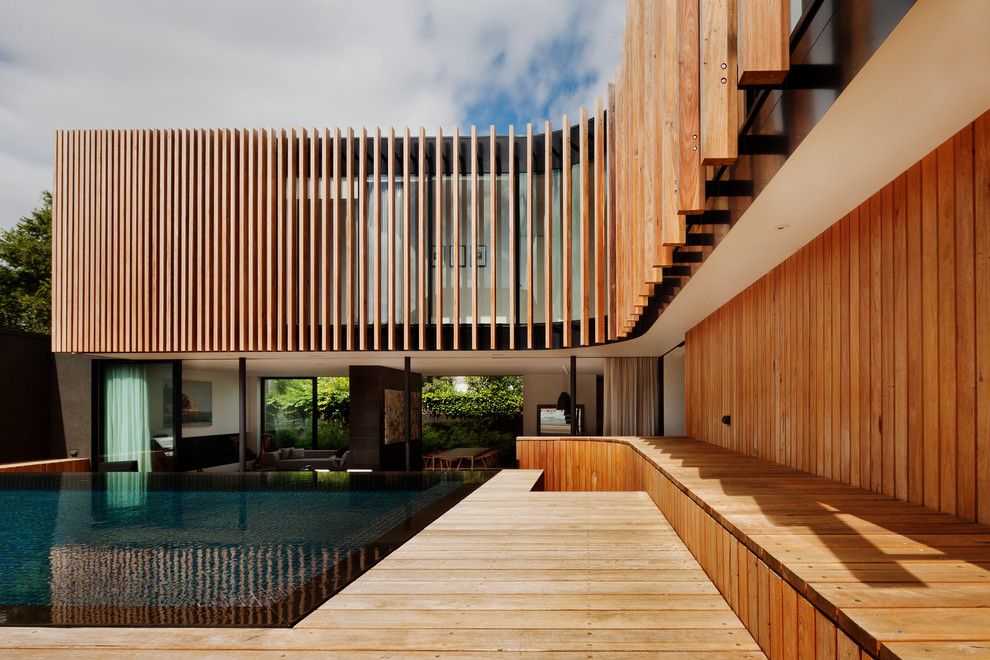 Louvered for a Contemporary Pool with a Curved and Kooyong Residence by Matt Gibson Architecture + Design