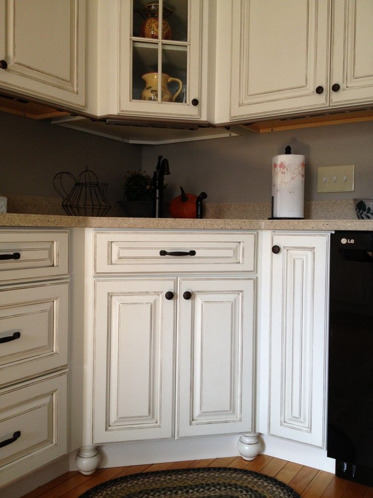 Lowes Concord Nh for a Farmhouse Kitchen with a Detail of Diagonal Sink Base with the Furniture Feet and Starling, Rollinsford, Nh by Lowe's of Rochester, Nh