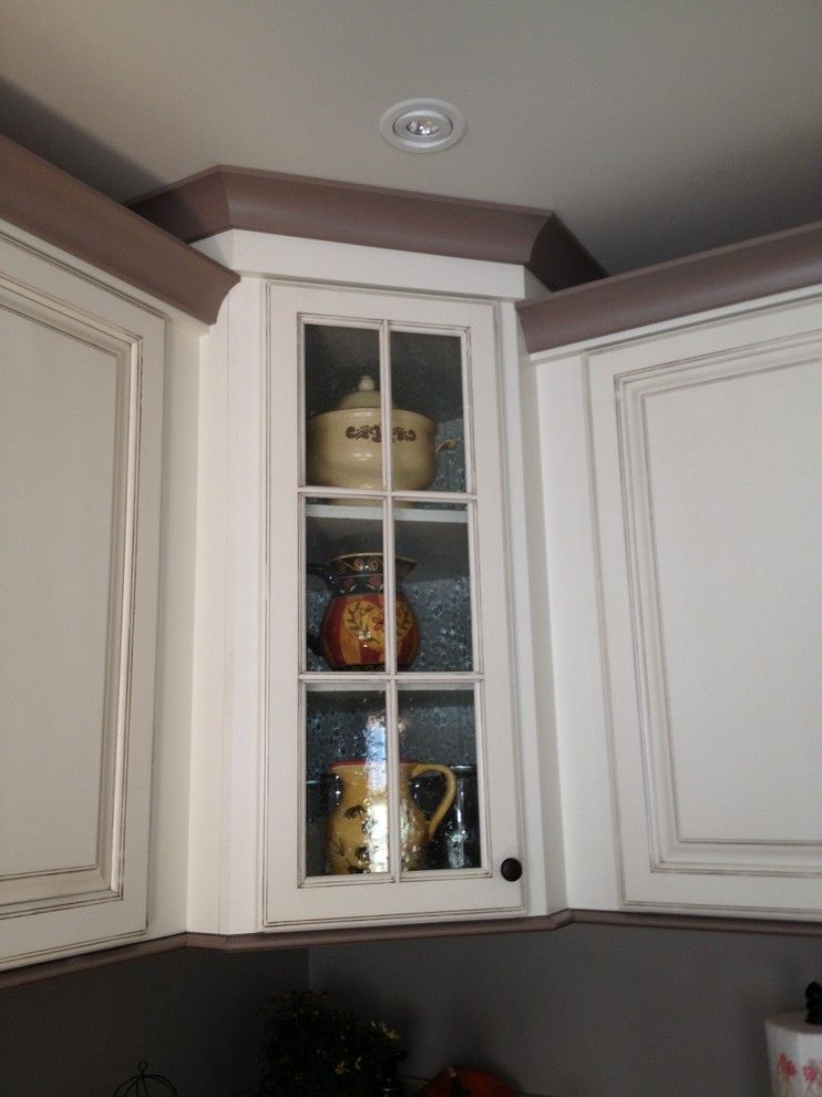 Lowes Concord Nh for a Farmhouse Kitchen with a Raised Height Cabinet with Crown Detail and Glass Door and Starling, Rollinsford, Nh by Lowe's of Rochester, Nh