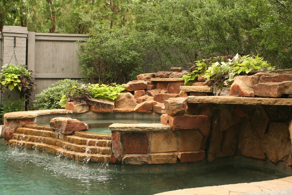 Lowes Dallas for a Transitional Landscape with a Hot Tub and Lush Backyard Landscape with Pool by Verdant Grounds