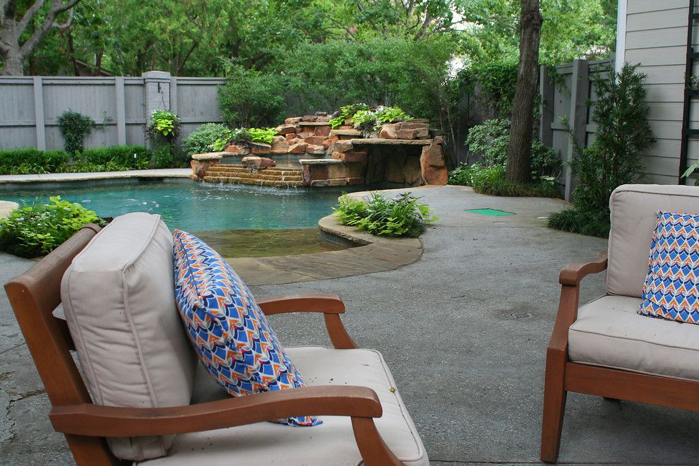 Lowes Dallas for a Transitional Landscape with a Landscape and Lush Backyard Landscape with Pool by Verdant Grounds