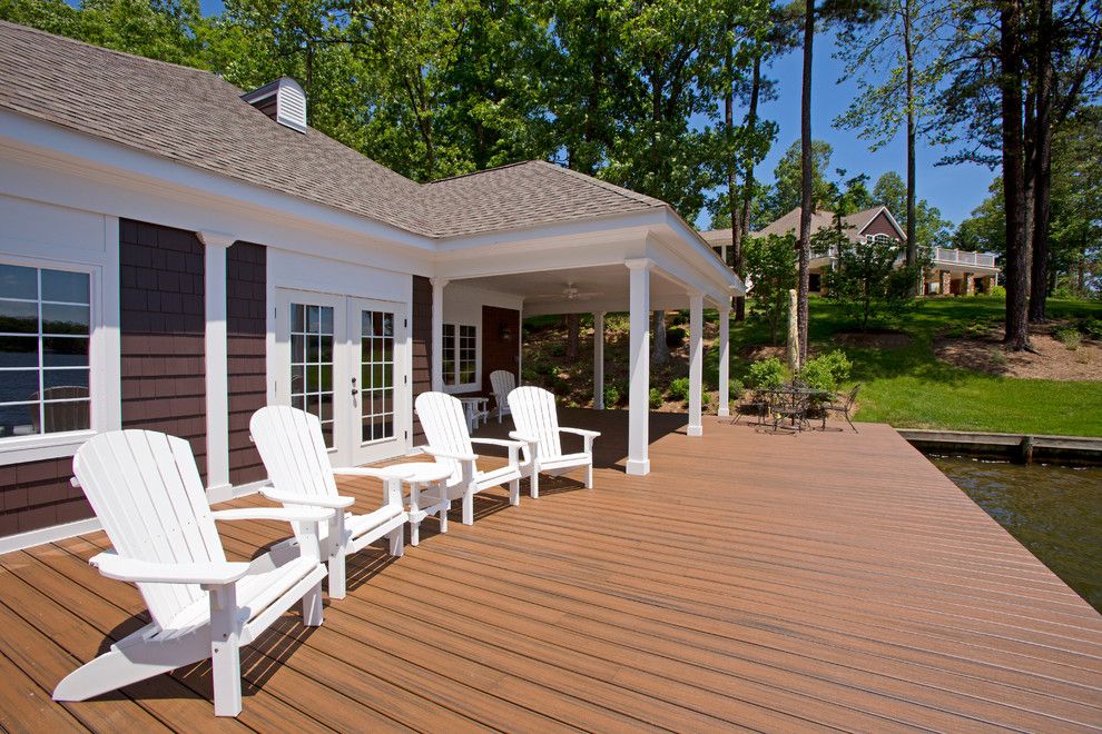 Lowes Deck Builder for a Traditional Deck with a White Adirondack Chairs and Boathouse by Kohlmark Architects and Builders