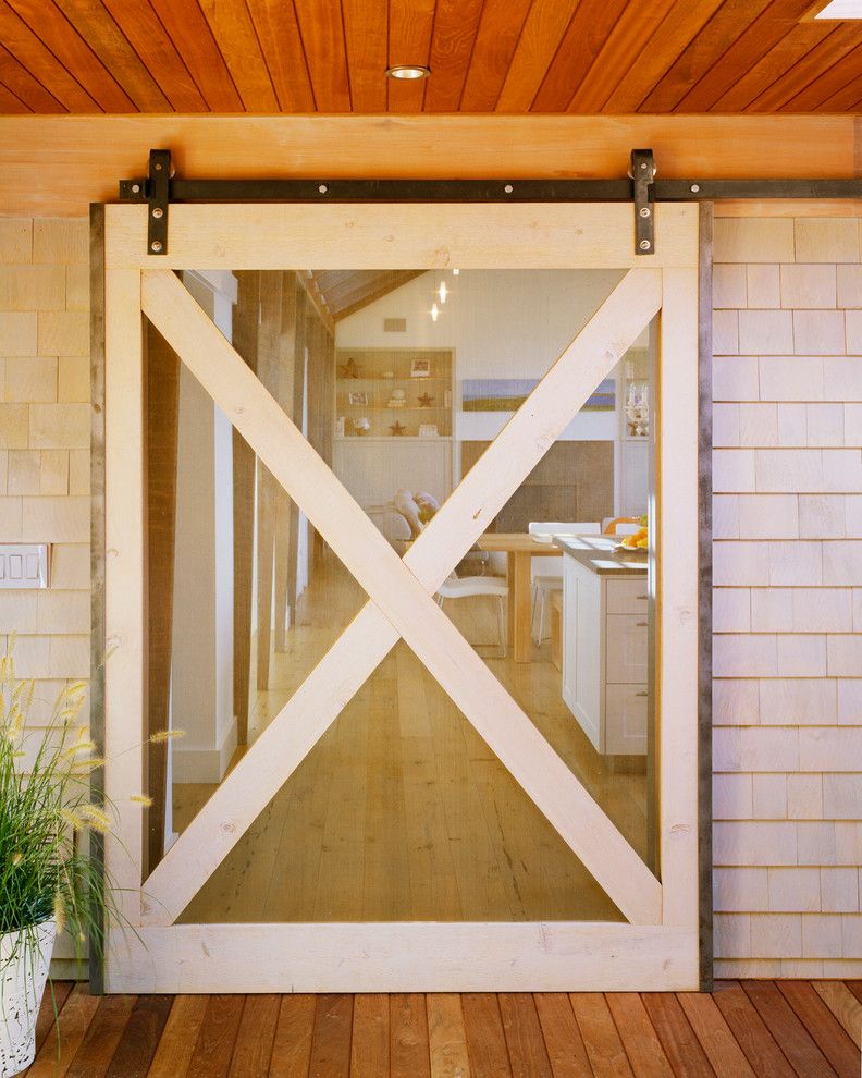 Lowes Door Installation for a Beach Style Entry with a Batten Screen Door and Cedar Point by Hutker Architects