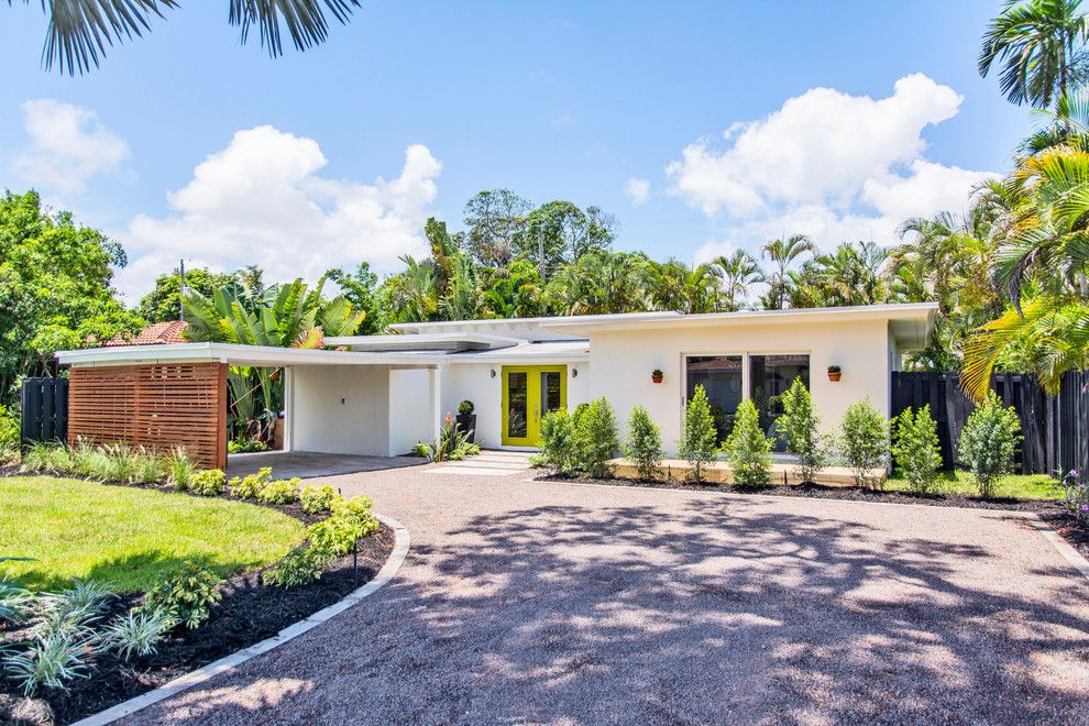 Lowes Labor Day Sale for a Midcentury Exterior with a Gravel Driveway and Ne 27th St. by Restore 818, Inc. Micek