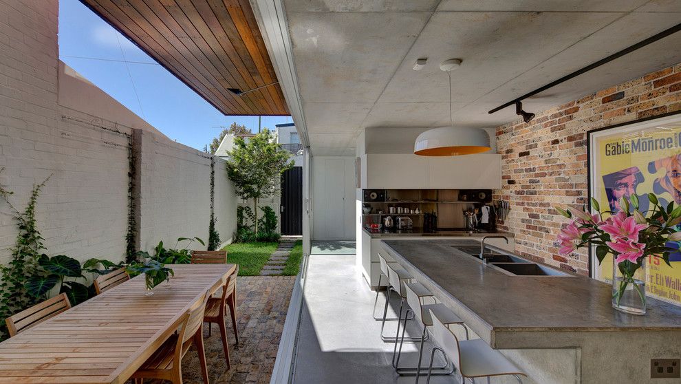 Lowes Queensbury Ny for a Contemporary Kitchen with a Large Pendant Light and Long Courtyard House by Scale Architecture