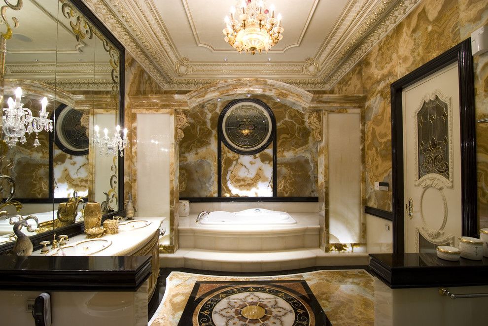 Luxe Hotel Sunset for a Traditional Bathroom with a Wainscoting and Our Mom's House by Erwin Hawawinata / Hawawinata N Associates