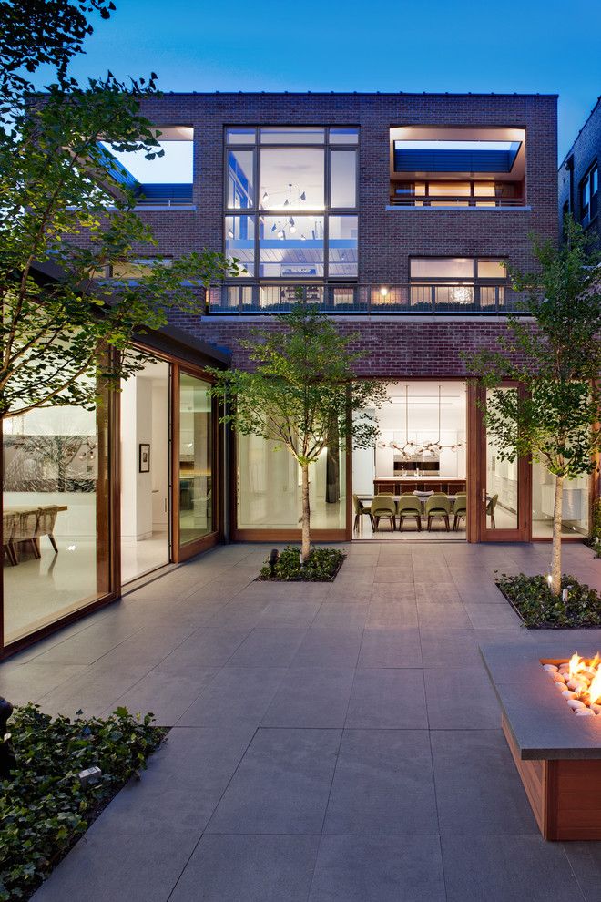 Magnolia Tree Care for a Industrial Patio with a Glass Doors and Mid North Residence by Vinci | Hamp Architects