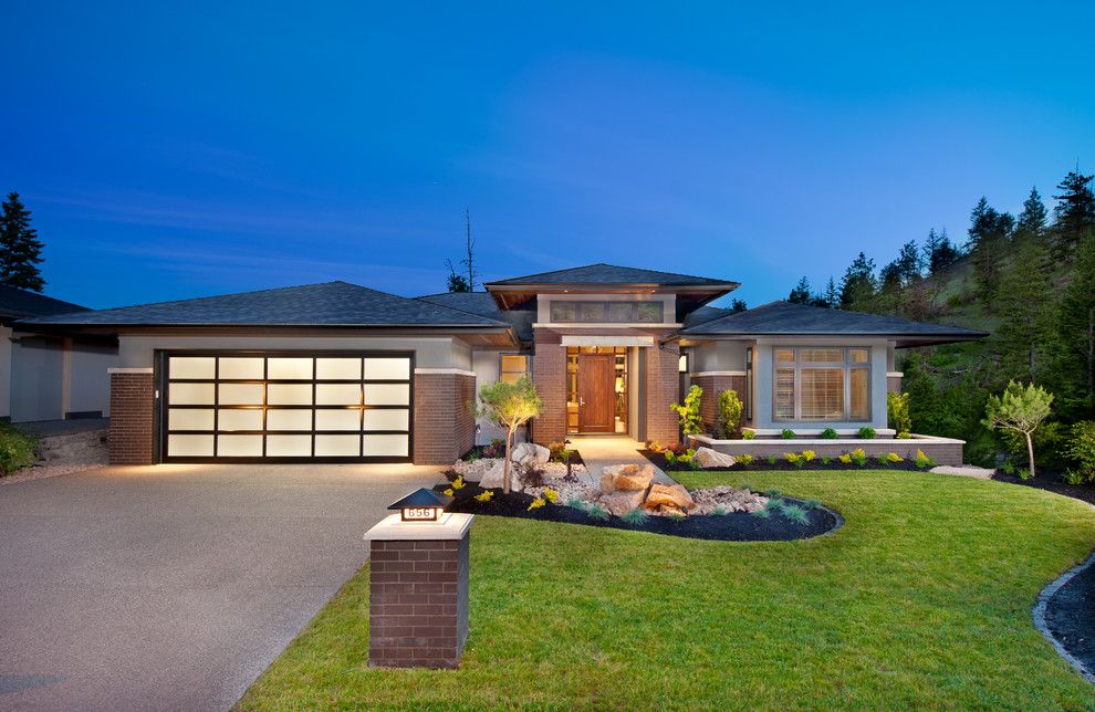 Mail Boxes Near Me for a Contemporary Exterior with a Lawn and the Cooper Show Home by Sticks and Stones Design Group Inc.