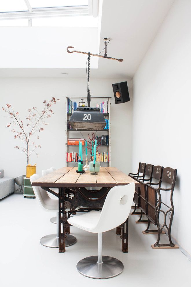 Majestic Theater Seating for a Eclectic Dining Room with a White Dining Chairs and My Houzz: A Dark Storage Space Transformation to a Crisp White Loft by Louise De Miranda