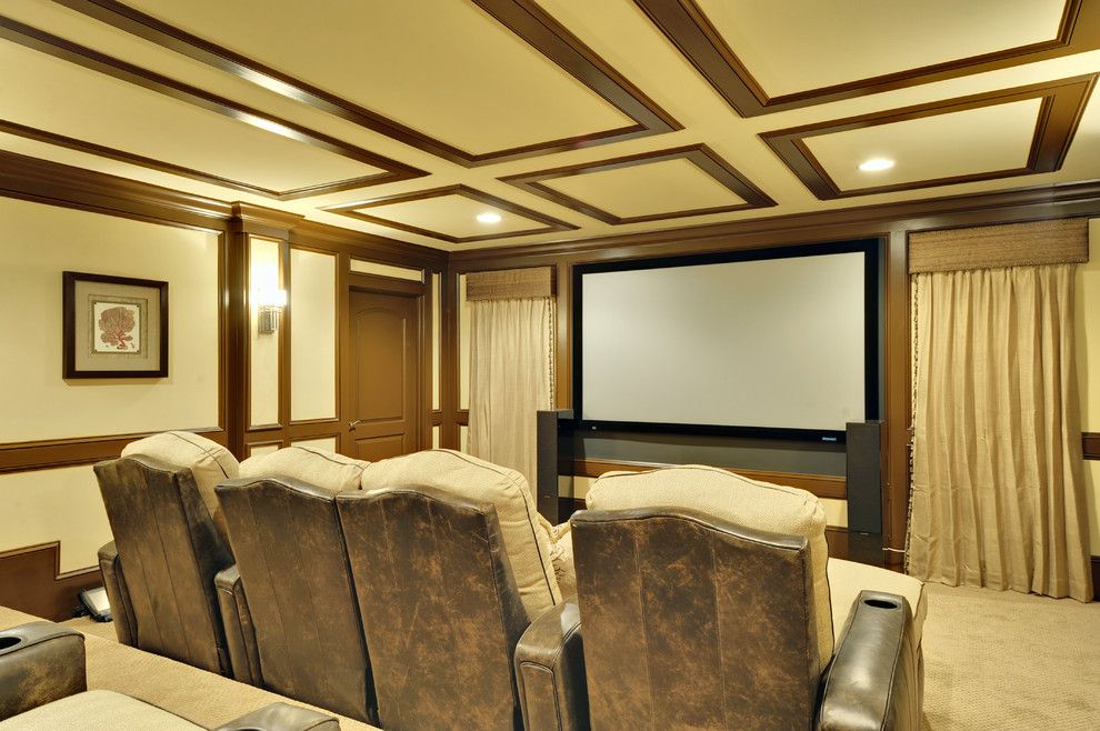 Majestic Theater Seating for a Traditional Home Theater with a Cream Carpet and Theatre by Echelon Custom Homes