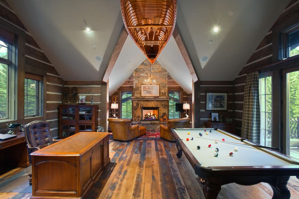 Mancaves for a Rustic Family Room with a Dry Stack and Vail Valley Retreat by Ulf & Associates