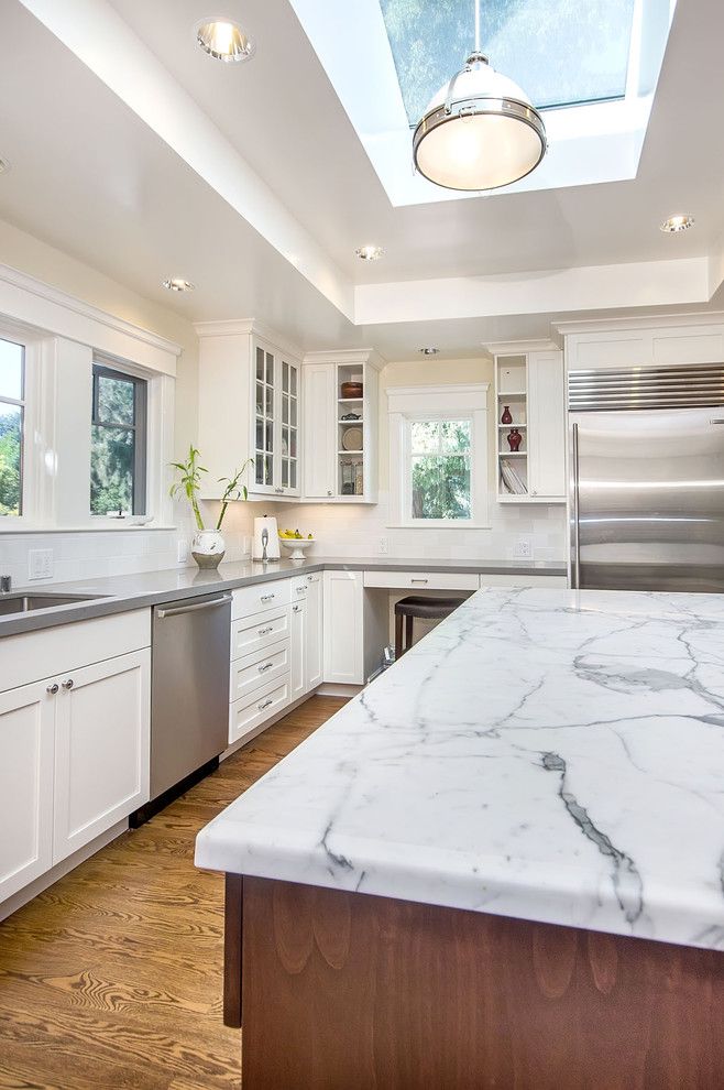 Marble Slab Locations for a Craftsman Kitchen with a White Cabinets and Menlo Park Residence by Studio S Squared Architecture, Inc.