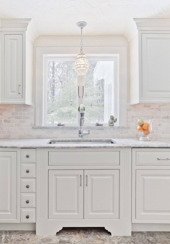 Marble Slab Near Me for a Traditional Kitchen with a Marble Countertop and White Kitchen by Cathy Stathopoulos, Ckd