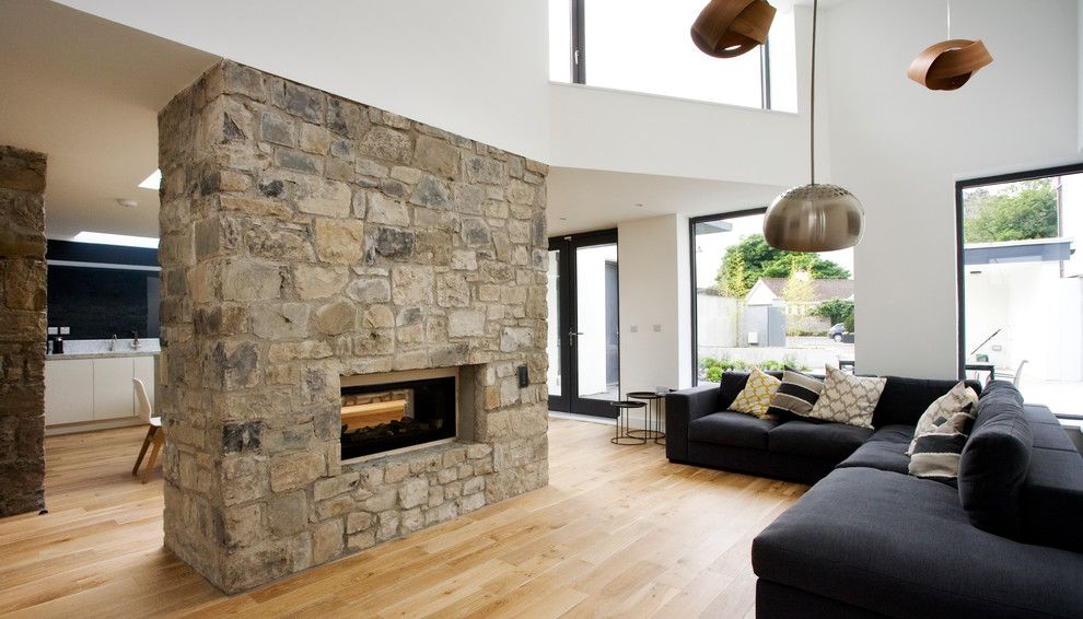 Marquis at Stone Oak for a Contemporary Living Room with a See Through Fireplace and Trim by Optimise Design