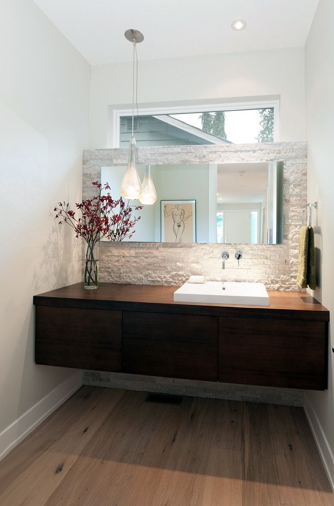 Marquis at Stone Oak for a Contemporary Powder Room with a White Stone Wall and Lloyd Avenue Residence by Erica Winterfield Design