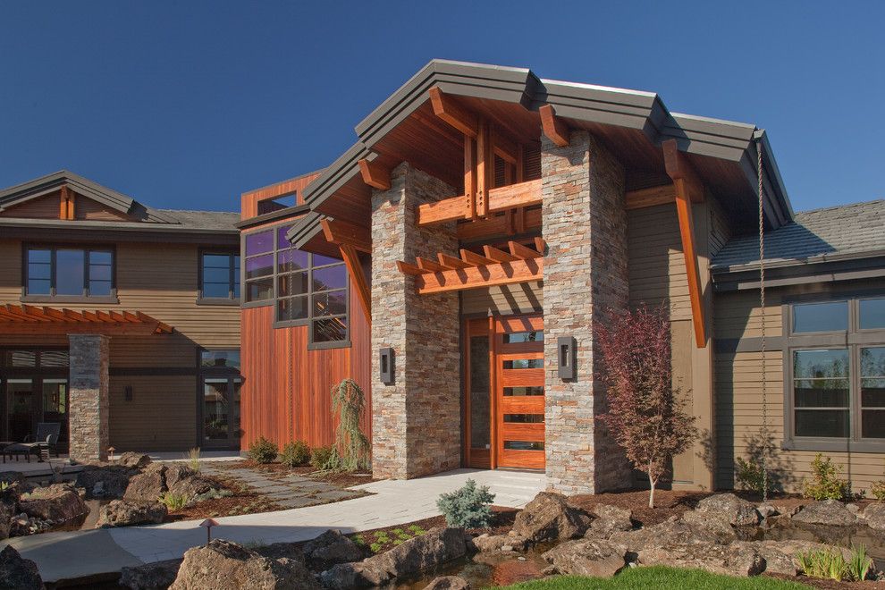 Medallion Homes for a Craftsman Exterior with a Stone Exterior and Highland's Home in Bend, or by Norman Building & Design