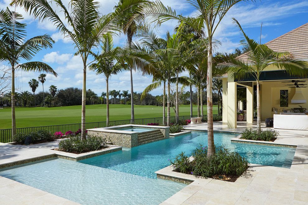 Medical Specialists of the Palm Beaches for a Tropical Pool with a Golf Course and Brighton at Quail West by London Bay Homes