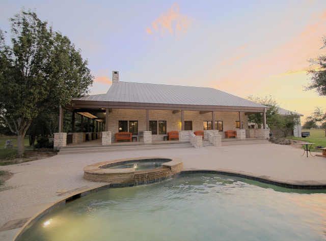 Meritage Homes Houston for a Traditional Patio with a Standing Seam Metal Roof and Showcase Home   Rear Elevation   Pool by Brothers Custom Works