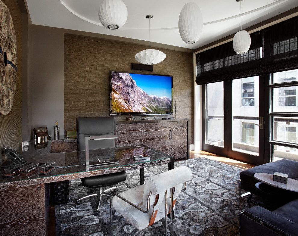 Mesko Glass for a Contemporary Home Office with a Gray Patterned Rug and Urban Chic by Morgante Wilson Architects