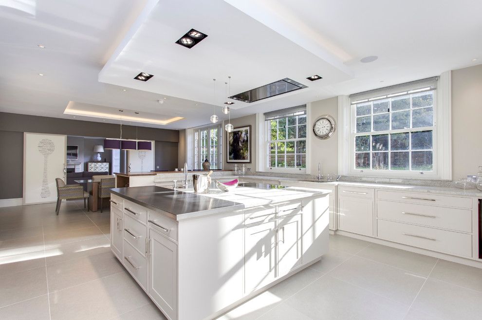 Meteor Lighting for a Transitional Kitchen with a Clock and Kylemore House by Hoban Design