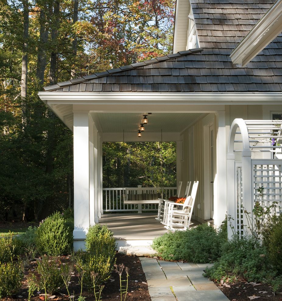 Midtown Arbor Place for a Beach Style Porch with a Board and Batten and Lakeside Family Cottage by Barnes Vanze Architects, Inc