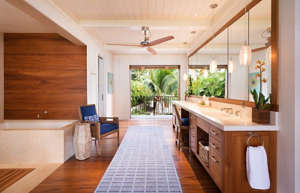 Mihomes for a Tropical Bathroom with a Wood Paneling and Maui Residence by April Powers Interior Design