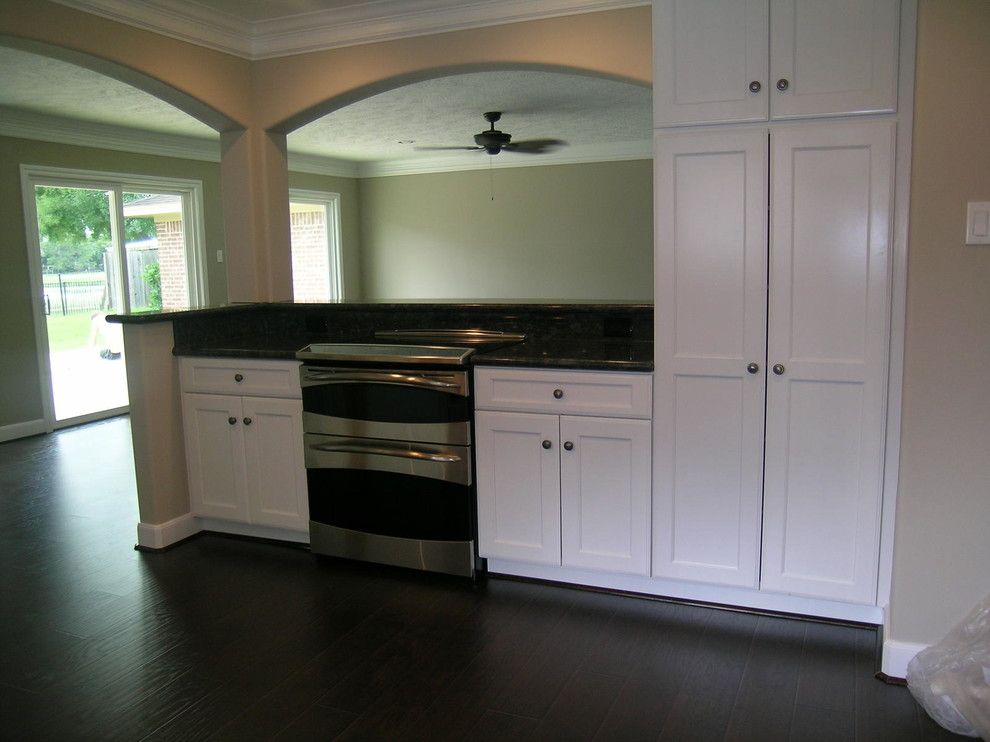 Mill Valley Golf Course for a Contemporary Kitchen with a Black Counters and Quail Valley Golf Course Home by Pride Custom Builders