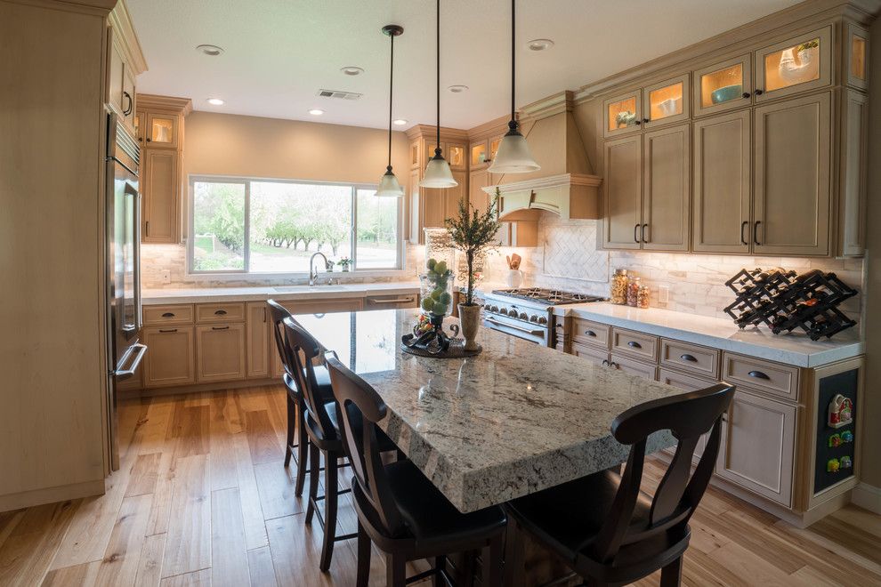 Modesto Steel for a Traditional Kitchen with a Pendant Lights and Ripon Kitchen Remodel by Fetter Contruction, Inc.