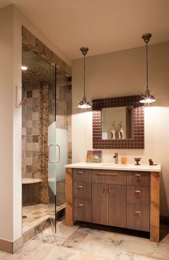 Moen Faucet Warranty for a Rustic Bathroom with a Pendant Light and Buckhorn Residence by Sunlit Architecture